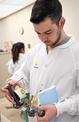 Photo of Dr. Samona in dental school class