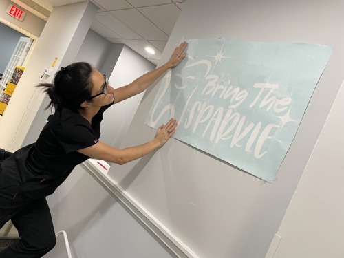 Photo of Dr. Muñoz decorating practice