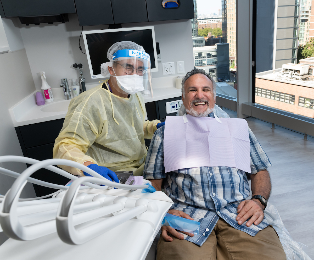 Dentist Dr. Brian Eng and VETSmile patient Tony