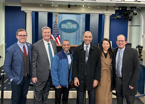 Photo of Dr. Bumann and others at White House