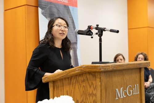 Photo of Dr. Lin as white coat ceremony keynote speaker
