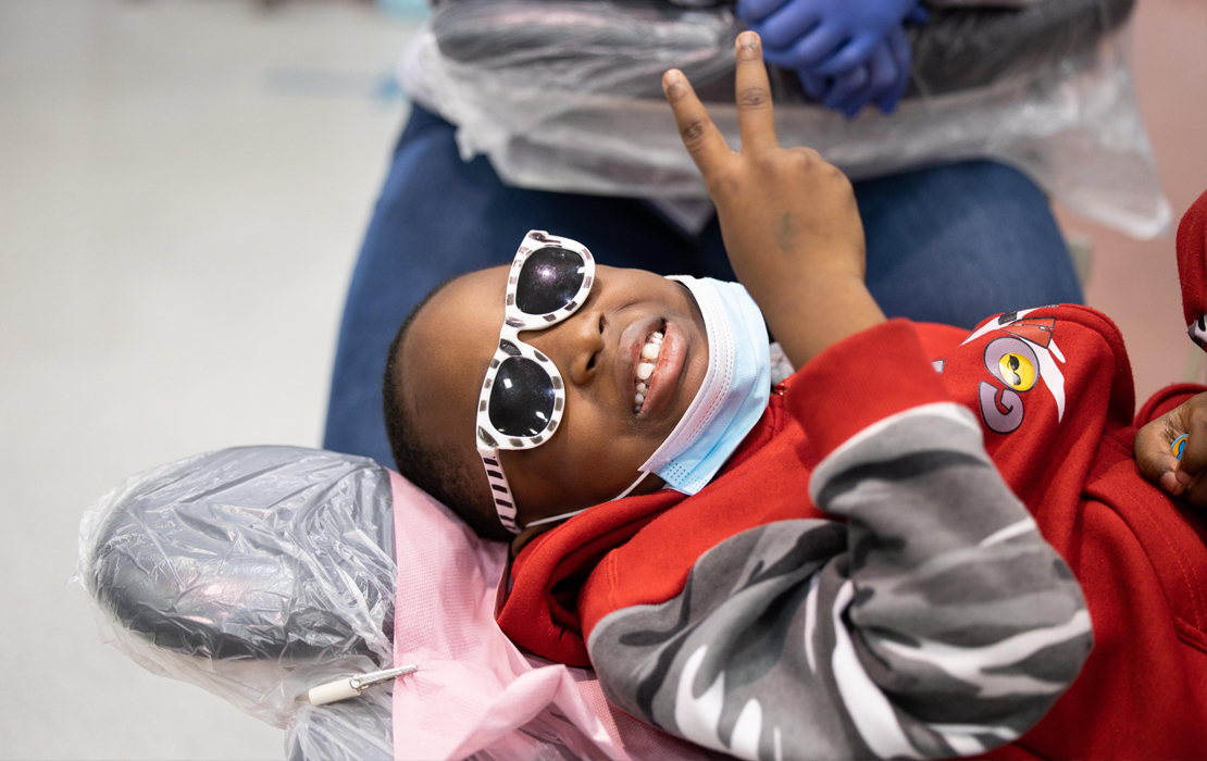 Peace: A child pauses during his examination Feb. 3 at the GKAS kickoff event in St. Louis.