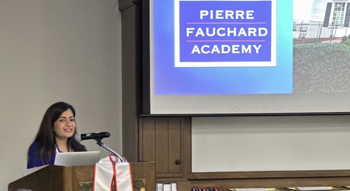 Photo of Dr. Setia at Pierre Fauchard Academy event