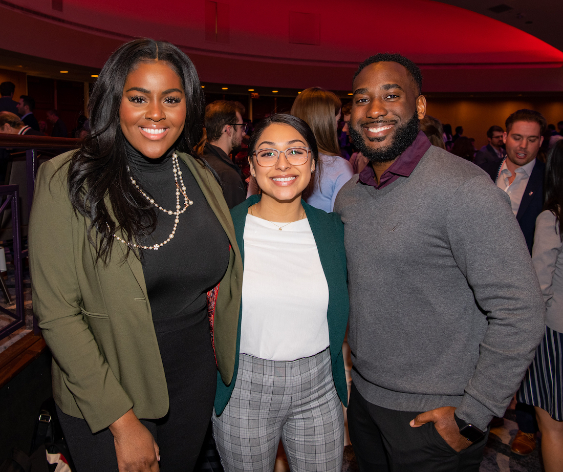 Photo of ASDA President Justina Anigbo and dental students Julissa Quiñonez and Donald Thompson