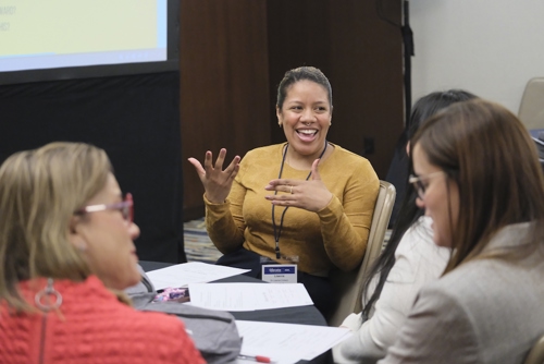 Photo of Elevate attendees in breakout session