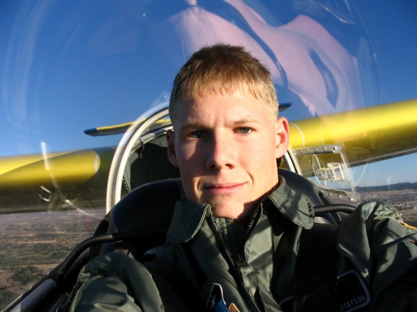 Dr. Gustafson piloting a glider plane