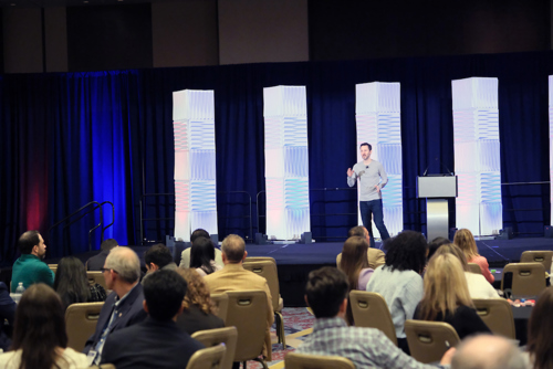 Photo of Jason Feifer on stage at Elevate