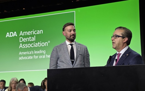 Photo of Rhett Raum, D.M.D. (left), and ADA President Richard Rosato, D.M.D.