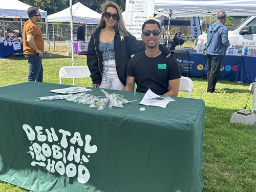 Photo of Dr. Sorrell at event with Dental Robin Hood