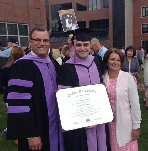 Photo of Dr. Tonelli and parents at graduation